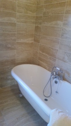 Bathrooms supplied and fitted by North West Tiles & Timber, Co. Leitrim, Ireland: including all sanitaryware, bathroom furniture, showers, baths and tiling