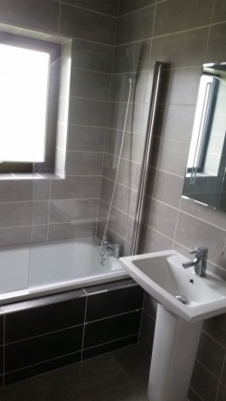 Bathrooms supplied and fitted by North West Tiles & Timber, Co. Leitrim, Ireland: including all sanitaryware, bathroom furniture, showers, baths and tiling