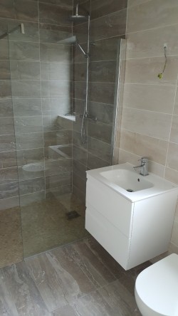 Bathrooms supplied and fitted by North West Tiles & Timber, Co. Leitrim, Ireland: including all sanitaryware, bathroom furniture, showers, baths and tiling