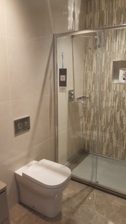 Bathrooms supplied and fitted by North West Tiles & Timber, Co. Leitrim, Ireland: including all sanitaryware, bathroom furniture, showers, baths and tiling