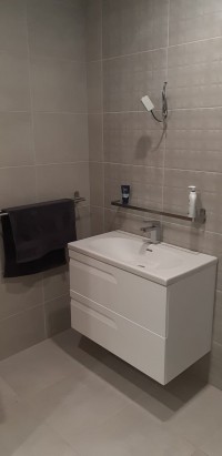Wall hung white vanity unit - new bathroom installation in a  Cavan home  by North West Tiles & Timber, Ireland
